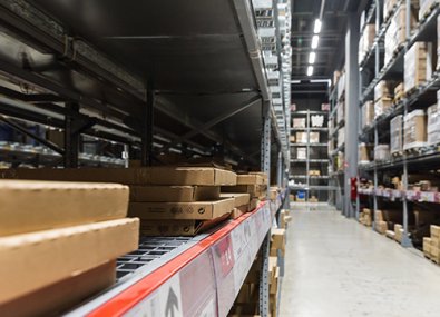How can custom loft-style shelves save costs?